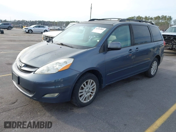 2009 Toyota Sienna XLE with VIN 5TDBK22C79S026370, listed as a IAAI auction lot 41471005 with 200,720 mi miles and . Bid and sale history available at DreamBid. Image 2.