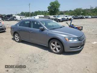 2014 Volkswagen Passat S z VIN 1VWAT7A34EC037407, wystawiony jako Copart lot #59512805 z przebiegiem 185 937 mil mil oraz Czysty tytuł • Clean title. Historia ofert i sprzedaży dostępna na DreamBid. Obrazek 4.
