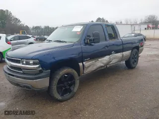 1999 Chevrolet Silverado 1500 LS with VIN 1GCEK19T5XE222985, listed as a IAAI auction lot 41497040 with 325,977 mi miles. Bid and sale history available at carsss.com. Image 2.
