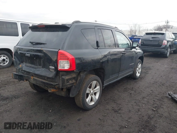2013 Jeep Compass Latitude with VIN 1C4NJDEB3DD221904, listed as a IAAI auction lot 41691631 with 134,683 mi miles. Bid and sale history available at carsss.com. Image 4.