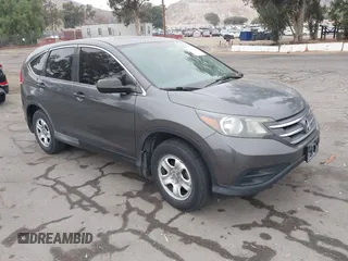 2012 Honda CR-V LX with VIN 2HKRM3H31CH500168, listed as a IAAI auction lot 42792999 with 296,819 mi miles and . Bid and sale history available at DreamBid. Image 1.