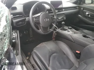 2023 Toyota GR Supra 3.0 with VIN WZ1DB0G09PW061258, listed as a Copart auction lot 77875554 with 0 mi miles and Salvage Title. Bid and sale history available at carsss.com. Image 8.