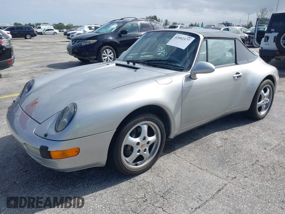 1998 Porsche 911 Carrera with VIN WP0CA2992WS340996, listed as a IAAI auction lot 42002177 with 47,222 mi miles. Bid and sale history available at carsss.com. Image 2.