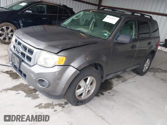 2009 Ford Escape XLS with VIN 1FMCU02759KC84959, listed as a IAAI auction lot 42219257 with 263,087 mi miles and . Bid and sale history available at DreamBid. Image 2.