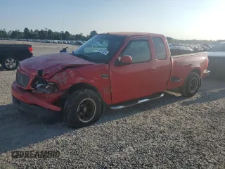 2001 Ford F-150 XL with VIN 2FTRX07LX1CA30894, listed as a Copart auction lot 74761224 with 0 mi miles and Salvage Title. Bid and sale history available at carsss.com. Image 1.