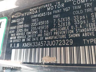 2018 Hyundai Kona Limited with VIN KM8K33A57JU072329, listed as a IAAI auction lot 41694616 with 107,801 mi miles. Bid and sale history available at carsss.com. Image 9.