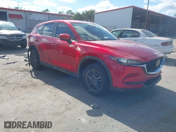 2020 Mazda CX-5 Sport with VIN JM3KFABM7L1819493, listed as a IAAI auction lot 41304240 with 52,940 mi miles. Bid and sale history available at carsss.com. Image 1.