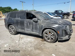 2020 Cadillac XT6 AWD Premium Luxury with VIN 1GYKPFRS7LZ151987, listed as a Copart auction lot 58315214 with 62,566 mi miles and Salvage Title. Bid and sale history available at carsss.com. Image 4.