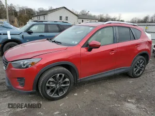 2016 Mazda CX-5 Grand Touring with VIN JM3KE4DY5G0730053, listed as a Copart auction lot 43776155 with 157,399 mi miles and Salvage Title. Bid and sale history available at carsss.com. Image 1.