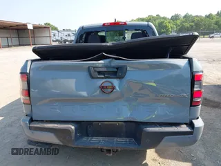 2023 Nissan Frontier SV with VIN 1N6ED1EK4PN622489, listed as a IAAI auction lot 42400562 with 25,595 mi miles and . Bid and sale history available at DreamBid. Image 16.