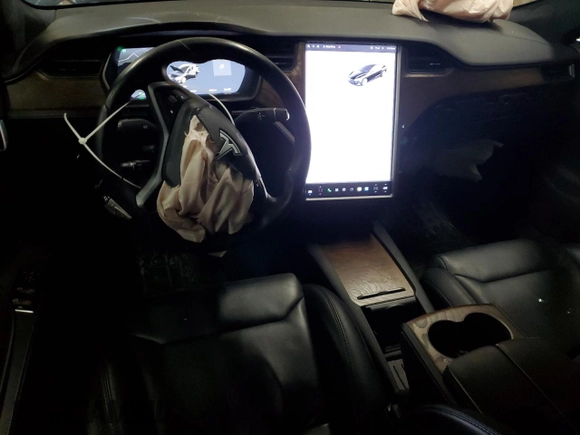 2019 Tesla Model S 100D с VIN 5YJSA1E46KF332553, выставлен на аукционе Copart как лот 41532825 с пробегом 131 073 миль миль и Списание • Salvage title. История ставок и продаж доступна на DreamBid. Изображение 8.