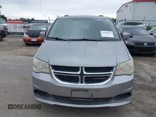2014 Dodge Grand Caravan SXT z VIN 2C4RDGCG3ER206620, wystawiony jako IAAI lot #42380639 z przebiegiem 201 580 mil mil oraz . Historia ofert i sprzedaży dostępna na DreamBid. Obrazek 6.