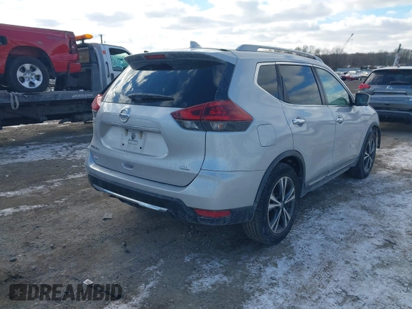 2018 Nissan Rogue S with VIN 5N1AT2MT2JC738034, listed as a IAAI auction lot 41286839 with 125,037 mi miles and . Bid and sale history available at DreamBid. Image 4.
