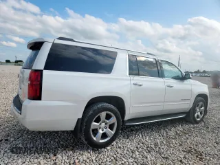 2017 Chevrolet Suburban Premier with VIN 1GNSCJKC1HR374998, listed as a Copart auction lot 60498905 with 240,652 mi miles and Salvage title. Bid and sale history available at DreamBid. Image 3.