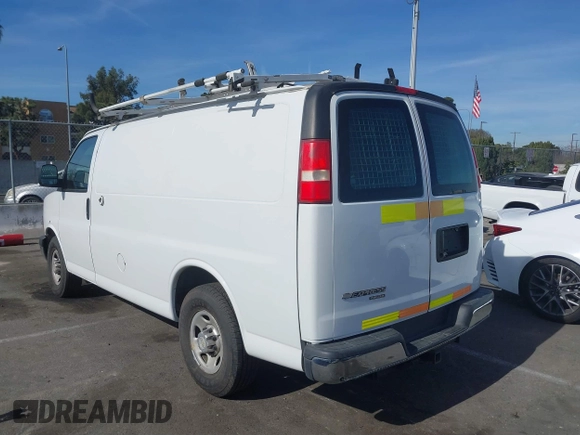 2014 Chevrolet Express Cargo Van with VIN 1GCWGFCB2E1122236, listed as a IAAI auction lot 41381131 with 70,696 mi miles. Bid and sale history available at carsss.com. Image 3.