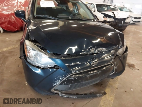 2016 Scion iA z VIN 3MYDLBZV5GY103533, wystawiony jako IAAI lot #41756270 z przebiegiem 59 290 mil mil oraz . Historia ofert i sprzedaży dostępna na DreamBid. Obrazek 6.