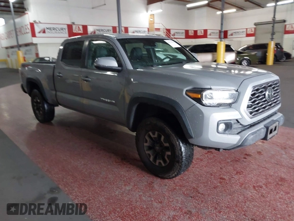 2021 Toyota Tacoma SR5 z VIN 3TMDZ5BN5MM114494, wystawiony jako IAAI lot #41723032 z przebiegiem 54 477 mil mil oraz . Historia ofert i sprzedaży dostępna na DreamBid. Obrazek 1.