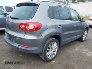 2011 Volkswagen Tiguan SE with VIN WVGBV7AX4BW532524, listed as a IAAI auction lot 41757552 with 141,115 mi miles and . Bid and sale history available at DreamBid. Image 4.