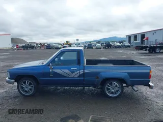 1988 Toyota Pickup with VIN JT4RN50R5J5169942, listed as a IAAI auction lot 42152517 with 218,579 mi miles and . Bid and sale history available at DreamBid. Image 15.