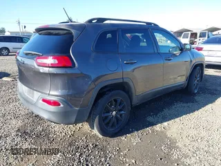 2014 Jeep Cherokee Latitude with VIN 1C4PJMCB5EW294631, listed as a IAAI auction lot 41453628 with 127,847 mi miles and . Bid and sale history available at DreamBid. Image 4.