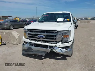 2023 Ford F-150 XL with VIN 1FTEW1C5XPFB51131, listed as a IAAI auction lot 41796307 with 31,068 mi miles and . Bid and sale history available at DreamBid. Image 12.