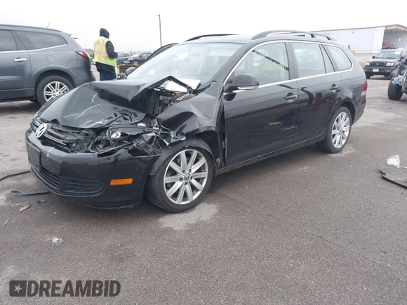 2012 Volkswagen Jetta TDI w/Sunroof & Nav z VIN 3VWPL7AJ7CM640498, wystawiony jako IAAI lot #40860464 z przebiegiem 128 505 mil mil oraz . Historia ofert i sprzedaży dostępna na DreamBid. Obrazek 2.