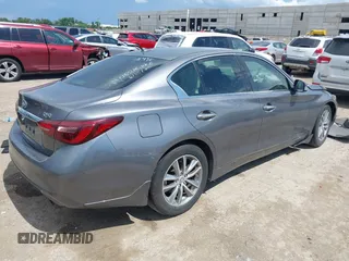 2021 Infiniti Q50 Pure with VIN JN1EV7AP7MM700241, listed as a IAAI auction lot 42586868 with 96,046 mi miles and . Bid and sale history available at DreamBid. Image 4.