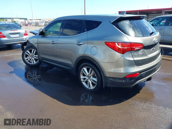 2013 Hyundai Santa Fe Sport z VIN 5XYZWDLA9DG064393, wystawiony jako IAAI lot #41601453 z przebiegiem 71 136 mil mil oraz . Historia ofert i sprzedaży dostępna na DreamBid. Obrazek 3.