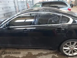 2015 Jaguar XF V6 Portfolio with VIN SAJWJ0FF5F8U57756, listed as a IAAI auction lot 41631278 with 47,158 mi miles. Bid and sale history available at carsss.com. Image 14.