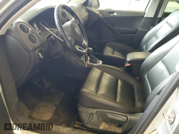 2013 Volkswagen Tiguan SE with VIN WVGBV7AX1DW504036, listed as a Copart auction lot 61126145 with 148,399 mi miles and Salvage title. Bid and sale history available at DreamBid. Image 7.