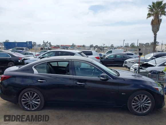 2019 Infiniti Q50 Luxe with VIN JN1EV7AP9KM543079, listed as a IAAI auction lot 42244113 with 36,291 mi miles and . Bid and sale history available at DreamBid. Image 13.
