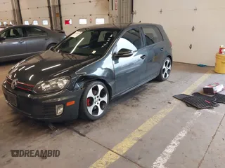 2012 Volkswagen GTI w/Sunroof & Navi PZEV with VIN WVWGD7AJ2CW100248, listed as a IAAI auction lot 41905190 with 106,489 mi miles and . Bid and sale history available at DreamBid. Image 2.