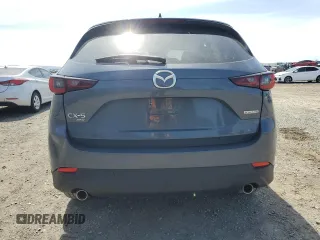 2023 Mazda CX-5 2.5 S Carbon Edition with VIN JM3KFBCM0P0256626, listed as a Copart auction lot 50818685 with 13,338 mi miles and Salvage Title. Bid and sale history available at carsss.com. Image 6.