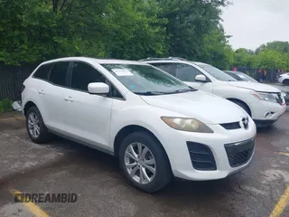 2010 Mazda CX-7 Touring z VIN JM3ER2W34A0328619, wystawiony jako IAAI lot #42359224 z przebiegiem 191 530 mil mil oraz . Historia ofert i sprzedaży dostępna na DreamBid. Obrazek 1.