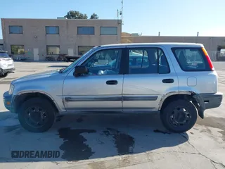 2001 Honda CR-V LX z VIN JHLRD28481S017409, wystawiony jako IAAI lot #41943942 z przebiegiem 134 999 mil mil oraz . Historia ofert i sprzedaży dostępna na DreamBid. Obrazek 14.