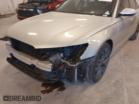 2014 Audi A6 Premium Plus with VIN WAUFGAFC7EN146819, listed as a IAAI auction lot 42072873 with 151,036 mi miles and . Bid and sale history available at DreamBid. Image 6.
