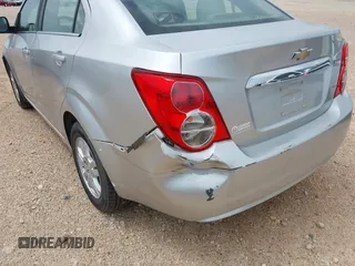 2013 Chevrolet Sonic LT with VIN 1G1JC5SB9D4195899, listed as a IAAI auction lot 42088459 with Not Provided miles and . Bid and sale history available at DreamBid. Image 6.