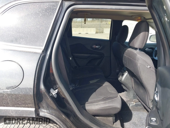 2015 Jeep Cherokee North with VIN 1C4PJMCS7FW544792, listed as a IAAI auction lot 41801573 with 140,575 mi miles. Bid and sale history available at carsss.com. Image 8.