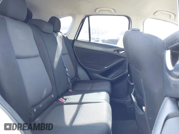 2013 Mazda CX-5 Sport with VIN JM3KE2BE4D0153251, listed as a IAAI auction lot 42297235 with 177,019 mi miles and . Bid and sale history available at DreamBid. Image 8.