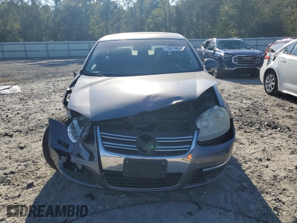 2006 Volkswagen Jetta z VIN 3VWDG71K26M673879, wystawiony jako Copart lot #75674634 z przebiegiem 93 689 mil mil oraz Szkoda całkowita • Salvage title. Historia ofert i sprzedaży dostępna na DreamBid. Obrazek 5.