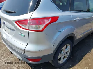 2013 Ford Escape SE z VIN 1FMCU0GX4DUA52665, wystawiony jako IAAI lot #42815684 z przebiegiem 248 336 mil mil oraz . Historia ofert i sprzedaży dostępna na DreamBid. Obrazek 6.