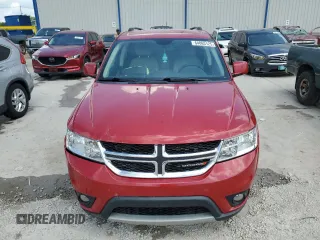 2018 Dodge Journey SXT with VIN 3C4PDCBG8JT310433, listed as a Copart auction lot 64063125 with 77,087 mi miles and Salvage title. Bid and sale history available at DreamBid. Image 5.