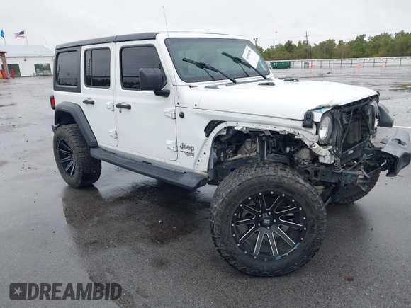 2019 Jeep Wrangler Unlimited Sport Altitude with VIN 1C4HJXDG3KW528647, listed as a IAAI auction lot 40986538 with 85,381 mi miles and . Bid and sale history available at DreamBid. Image 14.