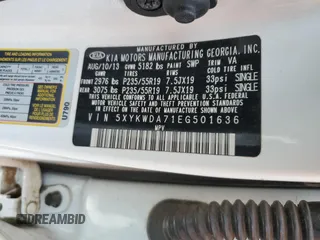 2014 Kia Sorento SX Limited z VIN 5XYKWDA71EG501636, wystawiony jako Copart lot #72324524 z przebiegiem 166 496 mil mil oraz Szkoda całkowita • Salvage title. Historia ofert i sprzedaży dostępna na DreamBid. Obrazek 13.