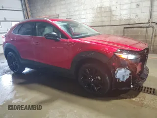 2021 Mazda CX-30 Premium Plus z VIN 3MVDMBEY9MM262293, wystawiony jako Copart lot #61369265 z przebiegiem 52 570 mil mil oraz Szkoda całkowita • Salvage title. Historia ofert i sprzedaży dostępna na DreamBid. Obrazek 4.