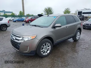2014 Ford Edge SEL z VIN 2FMDK4JC0EBA36381, wystawiony jako IAAI lot #42236973 z przebiegiem 146 053 mil mil oraz . Historia ofert i sprzedaży dostępna na DreamBid. Obrazek 2.