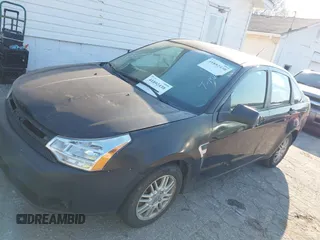 2008 Ford Focus SE with VIN 1FAHP35N28W209484, listed as a IAAI auction lot 41892438 with 311,456 mi miles. Bid and sale history available at carsss.com. Image 2.