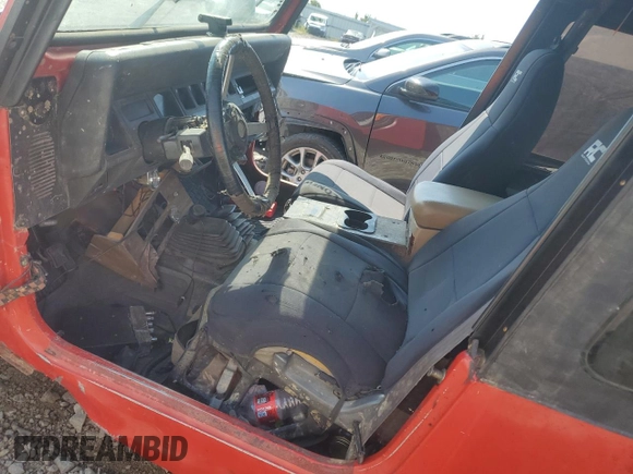 1995 Jeep Wrangler S with VIN 1J4FY19P1SP231891, listed as a Copart auction lot 69304234 with 0 mi miles and Salvage Title. Bid and sale history available at carsss.com. Image 7.
