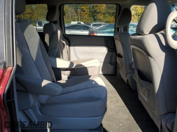 2012 Kia Sedona LX with VIN KNDMG4C77C6503605, listed as a Copart auction lot 77481894 with 103,026 mi miles and Salvage Title. Bid and sale history available at carsss.com. Image 11.