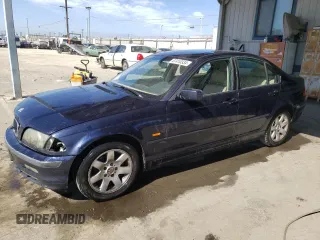 1999 BMW 3 Series 323i with VIN WBAAM333XXCA84143, listed as a Copart auction lot 67410334 with 229,026 mi miles and Salvage Title. Bid and sale history available at carsss.com. Image 1.